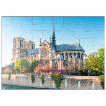 Darstellung des Puzzle Motivs puzzleplate Die Kathedrale Notre Dame de Paris an der Seine - Frankreich 100 Puzzle
