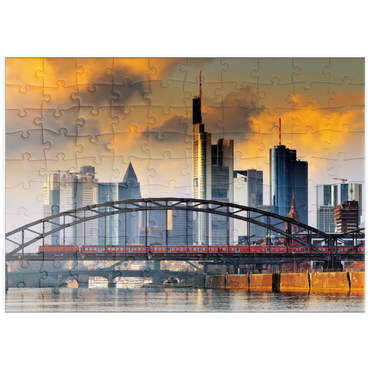 Darstellung des Puzzle Motivs puzzleplate Skyline von Frankfurt und Deutschherrnbrücke im Abendlicht 100 Puzzle