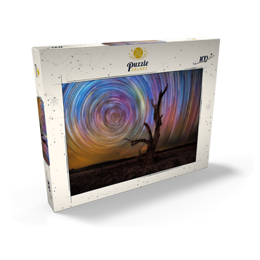 Darstellung des Puzzle Motivs Colorful Star Trails Above Barren Tree – Night Sky Spiral 100 Puzzle Schachtel Ansicht2