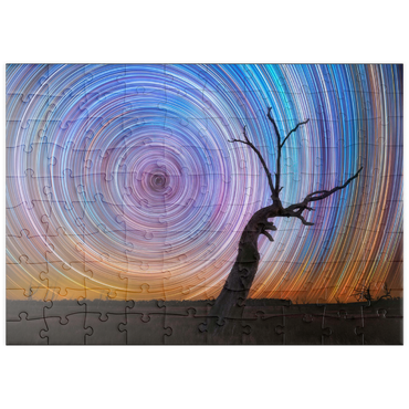 Darstellung des Puzzle Motivs puzzleplate Vibrant Star Trails Over Australian Outback Tree 100 Puzzle