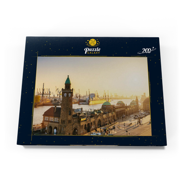 Darstellung des Puzzle Motivs Hamburg St. Pauli Landungsbrücken bei Sonnenuntergang, Deutschland 200 Puzzle Schachtel Ansicht3
