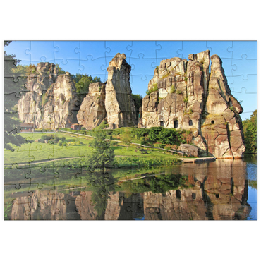 Darstellung des Puzzle Motivs puzzleplate Externsteine im Morgenlicht bei Horn-Bad Meinberg, Nordrhein-Westfalen, Deutschland 100 Puzzle
