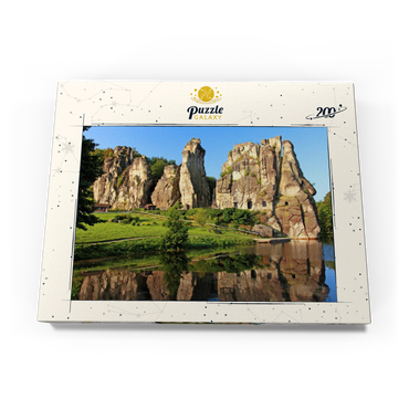 Darstellung des Puzzle Motivs Externsteine im Morgenlicht bei Horn-Bad Meinberg, Nordrhein-Westfalen, Deutschland 200 Puzzle Schachtel Ansicht3