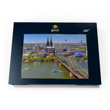 Darstellung des Puzzle Motivs Blick über den Rhein mit Kölner Dom und Hohenzollernbrücke, Köln 500 Puzzle Schachtel Ansicht3