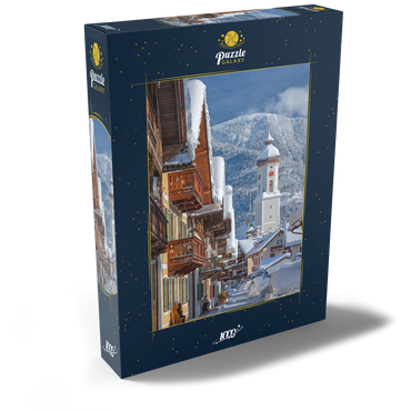 Darstellung des Puzzle Motivs Sonnenstraße mit Kirche St. Martin im Ortsteil Garmisch gegen Wank (1780m), Garmisch-Partenkirchen 1000 Puzzle Schachtel Ansicht2