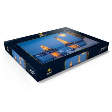 Darstellung des Puzzle Motivs Hafeneinfahrt mit Leuchtturm und Löwenstatue an einem Winterabend, Lindau 200 Puzzle Schachtel Ansicht1