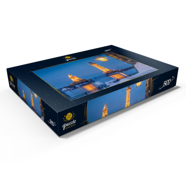 Darstellung des Puzzle Motivs Hafeneinfahrt mit Leuchtturm und Löwenstatue an einem Winterabend, Lindau 500 Puzzle Schachtel Ansicht1