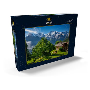 Darstellung des Puzzle Motivs Isenfluh, Weiler Sulwald (1520m) Hütte gegen Eiger (3970m), Mönch (4107m) und Jungfrau (4158m) 1000 Puzzle Schachtel Ansicht2