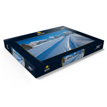 Darstellung des Puzzle Motivs Buckelwiesen bei Mittenwald gegen Wörner (2474m) und Karwendelgebirge 200 Puzzle Schachtel Ansicht1