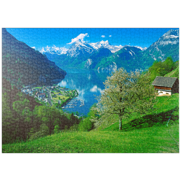 Darstellung des Puzzle Motivs puzzleplate Blick auf das Dorf am See gegen Gitschen und Urirotstock 1000 Puzzle