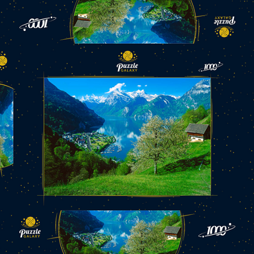 Darstellung des Puzzle Motivs Blick auf das Dorf am See gegen Gitschen und Urirotstock 1000 Puzzle Schachtel 3D Modell
