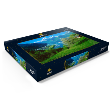 Darstellung des Puzzle Motivs Blick auf das Dorf am See gegen Gitschen und Urirotstock 200 Puzzle Schachtel Ansicht1