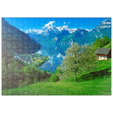 Darstellung des Puzzle Motivs puzzleplate Blick auf das Dorf am See gegen Gitschen und Urirotstock 200 Puzzle