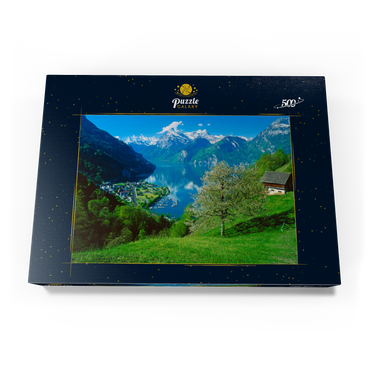 Darstellung des Puzzle Motivs Blick auf das Dorf am See gegen Gitschen und Urirotstock 500 Puzzle Schachtel Ansicht3