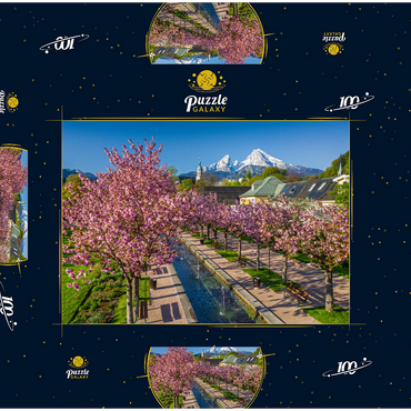 Darstellung des Puzzle Motivs Blühende Kirschbäume, Kirschblüte im Kurgarten von Berchtesgaden mit dem Watzmann 100 Puzzle Schachtel 3D Modell