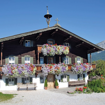 Darstellung des Puzzle Motivs Bergdoktor-Praxis in Ellmau in Tirol, Wilder Kaiser, Österreich 1000 Puzzle 3D Modell