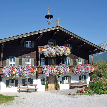 Darstellung des Puzzle Motivs Bergdoktor-Praxis in Ellmau in Tirol, Wilder Kaiser, Österreich 100 Puzzle 3D Modell