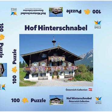 Darstellung des Puzzle Motivs Bergdoktor-Praxis in Ellmau in Tirol, Wilder Kaiser, Österreich 100 Puzzle Schachtel 3D Modell