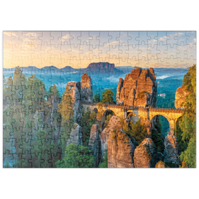 Darstellung des Puzzle Motivs Sonnenaufgang an der Bastei in der Sächsischen Schweiz, Sachsen, Deutschland - Puzzleteile: 200