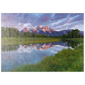 Darstellung des Puzzle Motivs Grand Teton Mountains bei Sonnenaufgang mit Spiegelung - Puzzleteile: 100