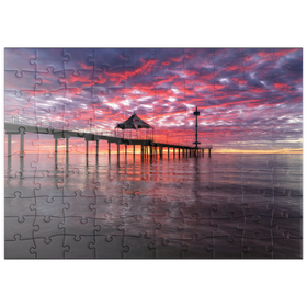 Darstellung des Puzzle Motivs Sonnenuntergang und Spiegelung am Brighton Jetty, Südaustralien - Puzzleteile: 100