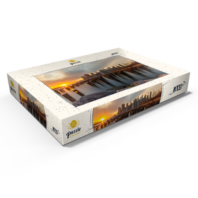 Darstellung des Puzzle Motivs Sonnenuntergang über der Skyline von Manhattan von Brooklyn aus - Puzzleteile: 1000