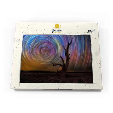 Darstellung des Puzzle Motivs Colorful Star Trails Above Barren Tree – Night Sky Spiral 100 Puzzle Schachtel Ansicht3