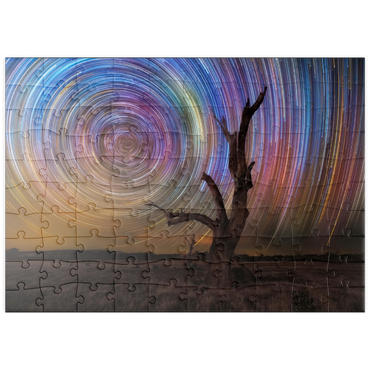 Darstellung des Puzzle Motivs puzzleplate Colorful Star Trails Above Barren Tree – Night Sky Spiral 100 Puzzle
