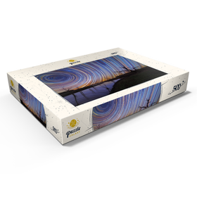 Darstellung des Puzzle Motivs Australische Sternspuren über einer sich spiegelnden Landschaft - Puzzleteile: 500