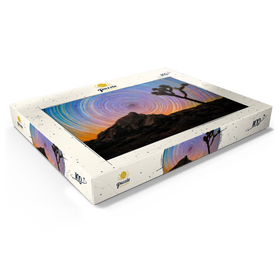 Darstellung des Puzzle Motivs Joshua Tree unter spiralförmigen Sternspuren - Puzzleteile: 100
