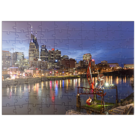Darstellung des Puzzle Motivs Nashville Skyline mit Spiegelungen des Cumberland River in der Abenddämmerung - Puzzleteile: 100