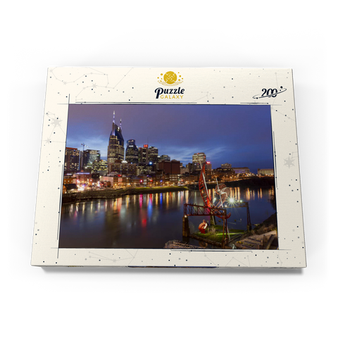 Darstellung des Puzzle Motivs Nashville Skyline mit Spiegelungen des Cumberland River in der Abenddämmerung Nashville Skyline with Cumberland River Reflections at Dusk 200 Puzzle Schachtel Ansicht3
