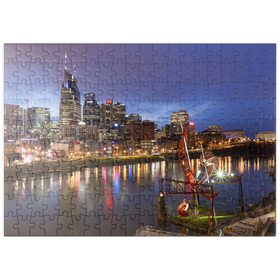 Darstellung des Puzzle Motivs Nashville Skyline mit Spiegelungen des Cumberland River in der Abenddämmerung - Puzzleteile: 200