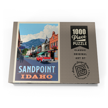 Darstellung des Puzzle Motivs Sandpoint, Idaho: Downtown Street and Mountains 1000 Puzzle Schachtel Ansicht3