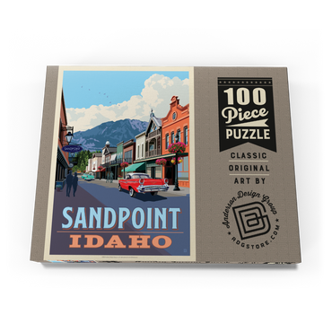 Darstellung des Puzzle Motivs Sandpoint, Idaho: Downtown Street and Mountains 100 Puzzle Schachtel Ansicht3