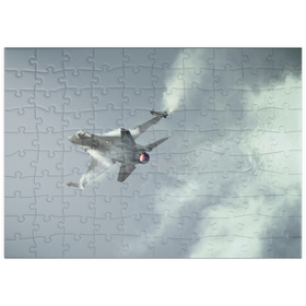 Darstellung des Puzzle Motivs General Dynamics F-16C Fighting Falcon - Puzzleteile: 100