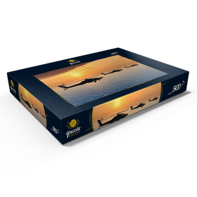 Darstellung des Puzzle Motivs Apache-Hubschrauber über dem Meer - Puzzleteile: 500