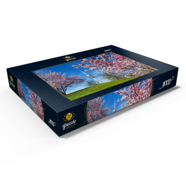 Kirschblüte im Olympiapark am Olympiaturm, München, - Deutschland 1000 Puzzle Schachtel Ansicht1