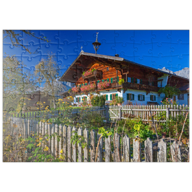 Darstellung des Puzzle Motivs Bauernhaus gegen Kaisergebirge (2344m), Reith bei Kitzbühel, Österreich - Puzzleteile: 100