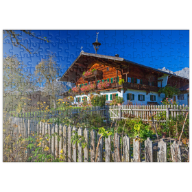 Darstellung des Puzzle-Motivs Bauernhaus gegen Kaisergebirge (2344m), Reith bei Kitzbühel, Österreich – Puzzleteile: 200