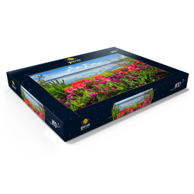 Darstellung des Puzzle Motivs Seepromenade in Überlingen am Bodensee im Frühling zur Tulpenblüte - Puzzleteile: 100