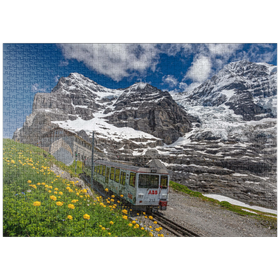 Darstellung des Puzzle-Motivs Jungfraubahn an der Station Eiger Gletscher gegen Eiger und Mönch – Puzzleteile: 1000