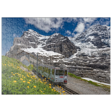 puzzleplate Jungfraubahn an der Station Eiger Gletscher (2320m) gegen Eiger (3970m) und Mönch (4107m) 200 Puzzle