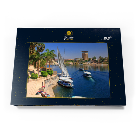 Feluken am Ufer der Kitchener Insel mit Blick über den Nil, Assuan, Ägypten 1000 Puzzle Schachtel Ansicht3