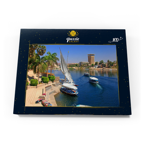 Feluken am Ufer der Kitchener Insel mit Blick über den Nil, Assuan, Ägypten 100 Puzzle Schachtel Ansicht3