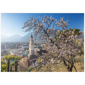 Darstellung des Puzzle-Motivs Blühender Mandelbaum mit Blick vom Tappeinerweg mit der Pfarrkirche St. Nikolaus – Puzzleteile: 1000