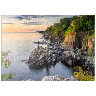 puzzleplate Sonnenaufgang an den Helligdomsklipperne, einer Felsenküste nördlich von Gudhjem 100 Puzzle