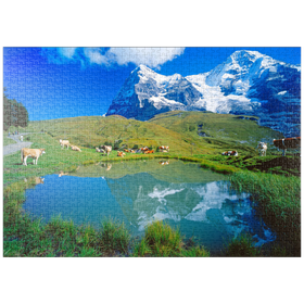Darstellung des Puzzle-Motivs Kühe am Weiher gegen Eiger-Nordwand (3970m) und Mönch (4107m) – Puzzleteile: 1000