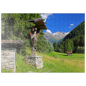 Darstellung des Puzzle Motivs Luis Trenker Kreuz im Malerwinkel, Kötschachtal mit Bocksteinkogel und Tischlergruppe - Puzzleteile: 200