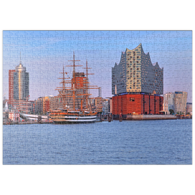 Darstellung des Puzzle Motivs Segelschiff Amerigo Vespucci an der Überseebrücke im Hafen mit Elbphilharmonie - Puzzleteile: 500